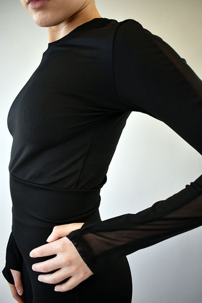 Model wearing Glitteractive Forme Top in Black