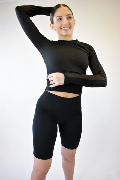 Model wearing Glitteractive Forme Top in Black